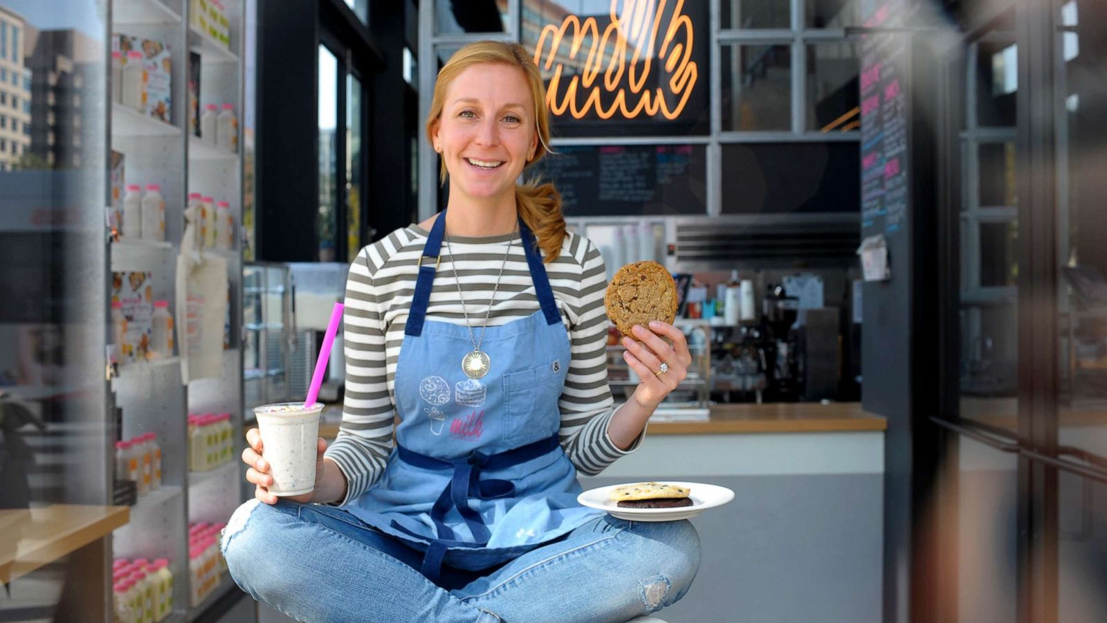 PHOTO: In this Oct. 22, 2015, file photo, Christina Tosi, with a birthday cake shake and signature cookie, poses in Milk Bar which opened in Washington, D.C.