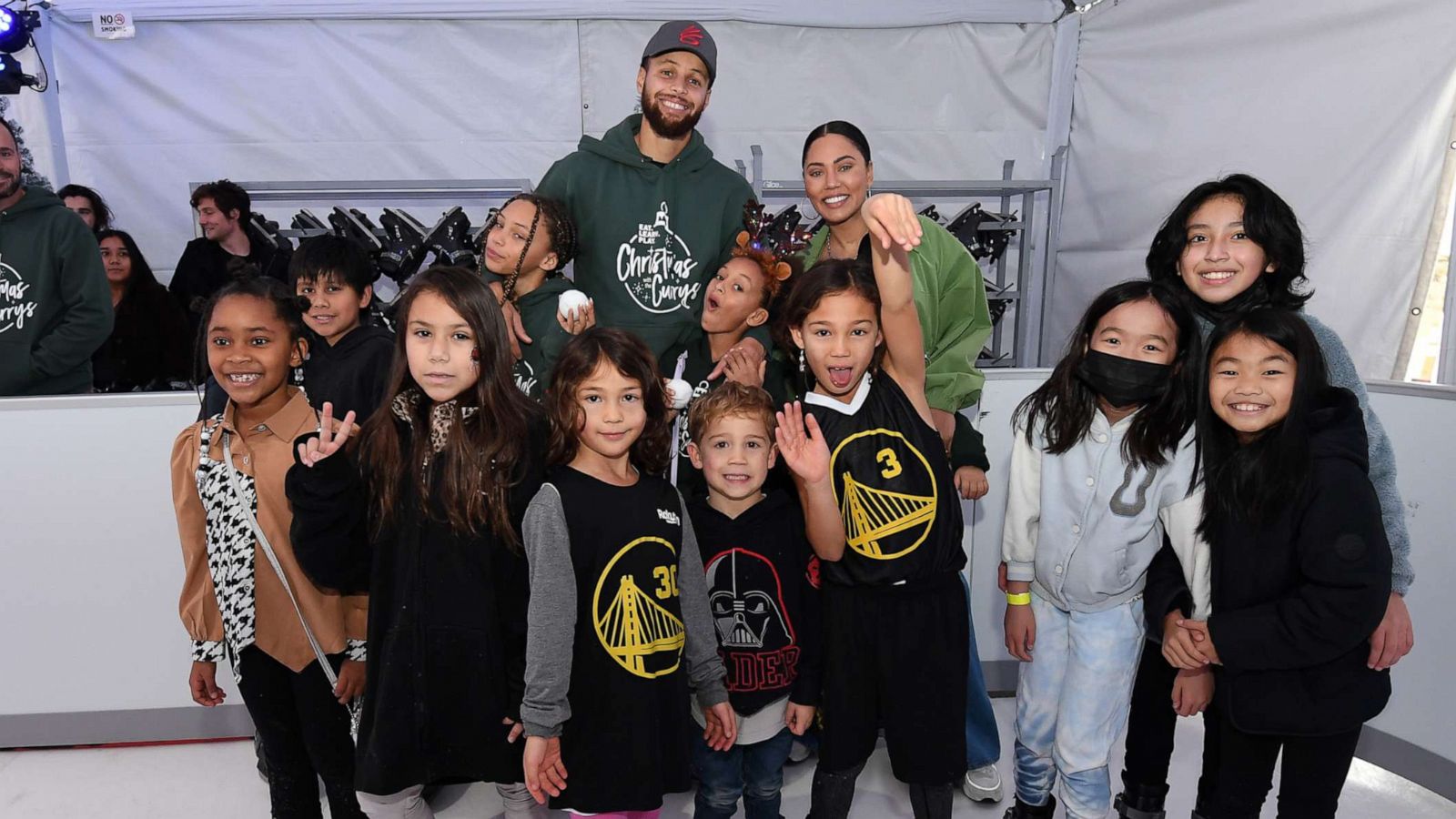 PHOTO: Chris Helfrich, Riley Elizabeth Curry, Stephen Curry, Ryan Carson Curry and Ayesha Curry attends Eat. Learn. Play.'s 10th Annual Christmas with the Currys Celebration at The Bridge Yard on Dec. 11, 2022 in Oakland, Ca.
