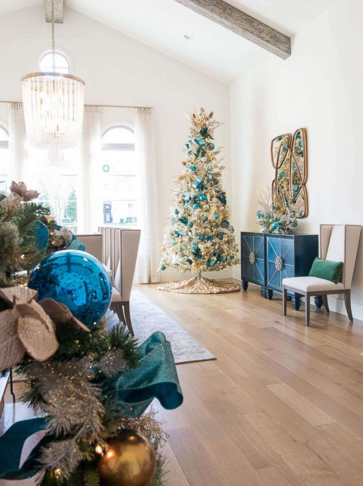 PHOTO: A dining room is decorated for Christmas by Baker Design Group.