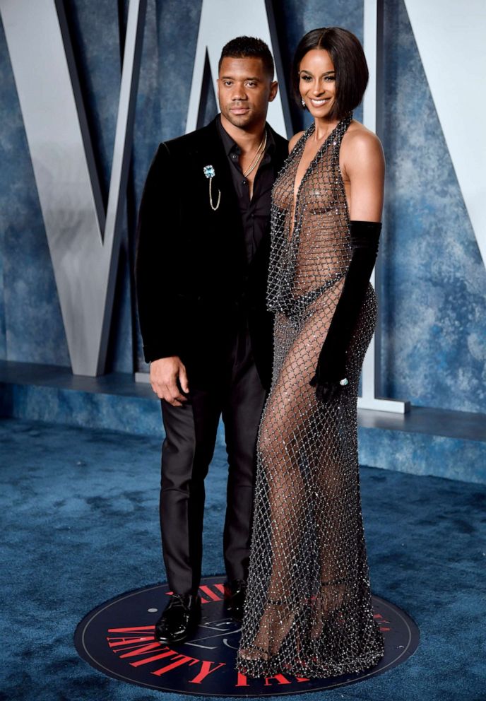 PHOTO: Russell Wilson, left, and Ciara arrive at the Vanity Fair Oscar Party, March 12, 2023, at the Wallis Annenberg Center for the Performing Arts in Beverly Hills, Calif.