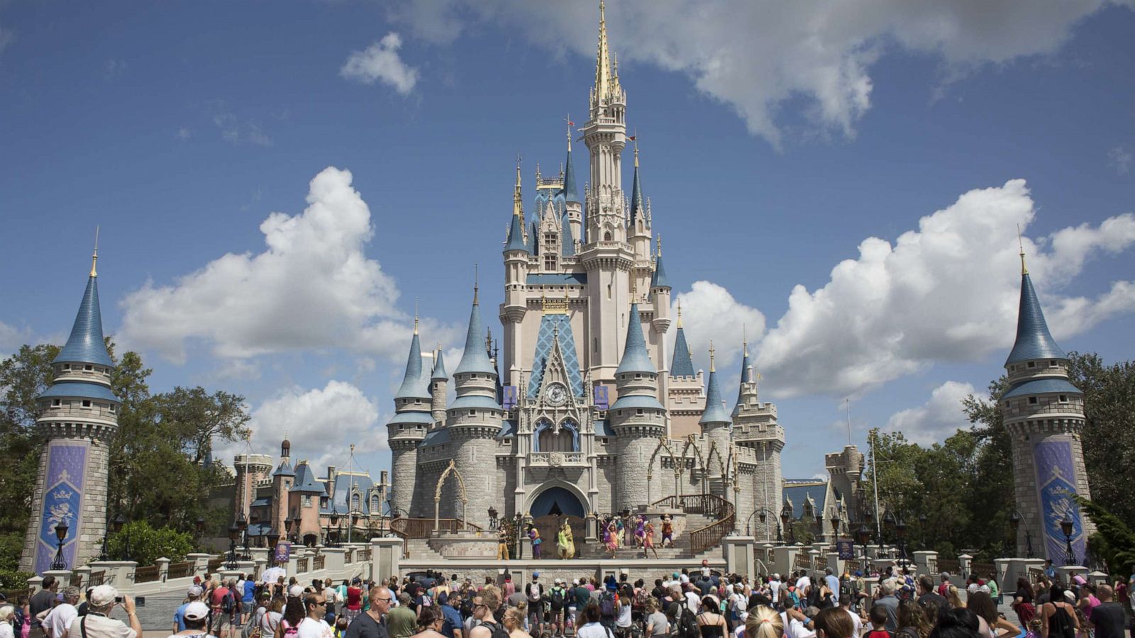 PHOTO: Visitors watch a performance at the Cinderella Castle at the Walt Disney Co. Magic Kingdom park in Orlando, Fla., Sept. 12, 2017.