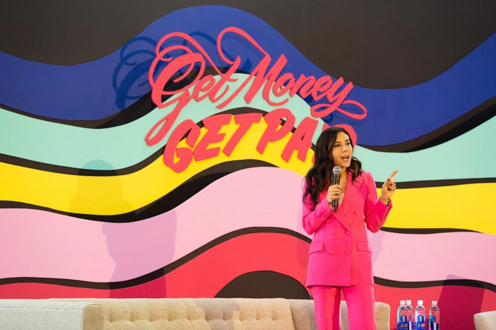 Claire Wasserman, founder of Ladies Get Paid, speaks to a group of women during an event.PHOTO: 