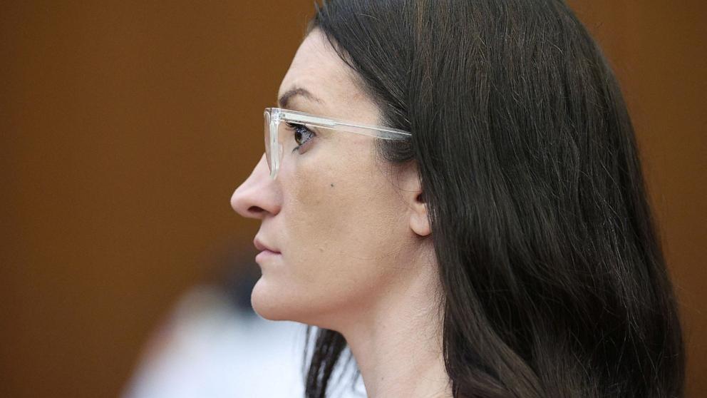 PHOTO: Defendant Lindsay Clancy listens to Dr. Jennifer Tufts on the witness stand during Lindsay Clancy's murder trial at Plymouth Superior Court, in Plymouth, Mass., Aug. 10, 2026. 