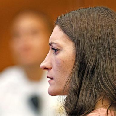 PHOTO: Lindsay Clancy, who is accused of killing her children, watches as her ex-husband Patrick Clancy takes the witness stand, during her murder trial at Plymouth Superior Court, in Plymouth, Massachusetts, July 27, 2026.