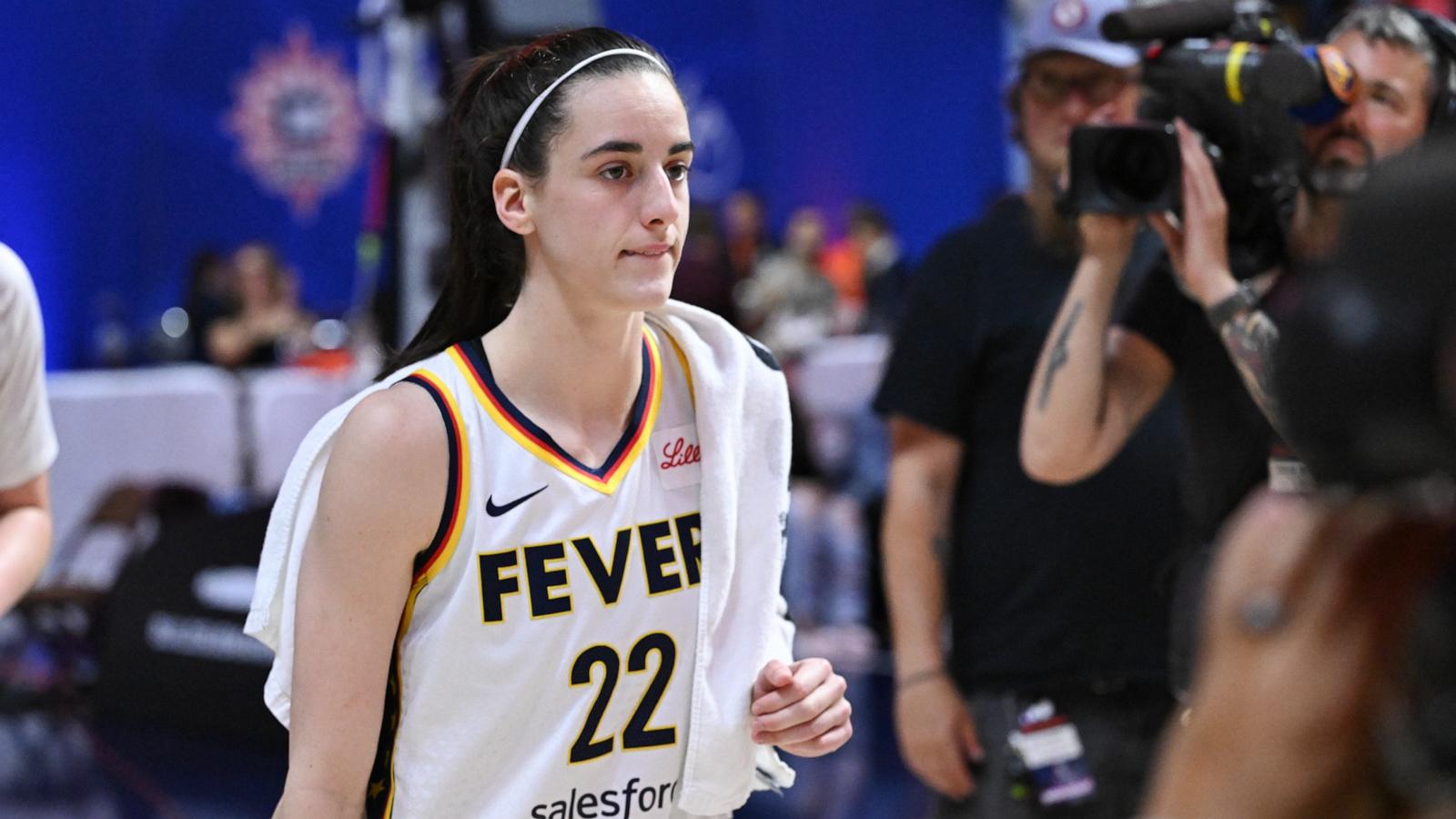 PHOTO: Caitlin Clark #22 of the Indiana Fever walks off of the court after a game against the Connecticut Sun during the second half at the Mohegan Sun Arena, June 10, 2024, in Uncasville, Conn.