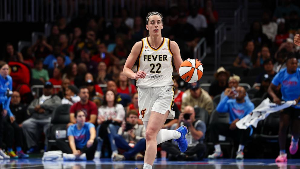 PHOTO: Caitlin Clark #22 of the Indiana Fever dribbles during the first quarter against the Atlanta Dream at State Farm Arena, June 20, 2026, in Atlanta.