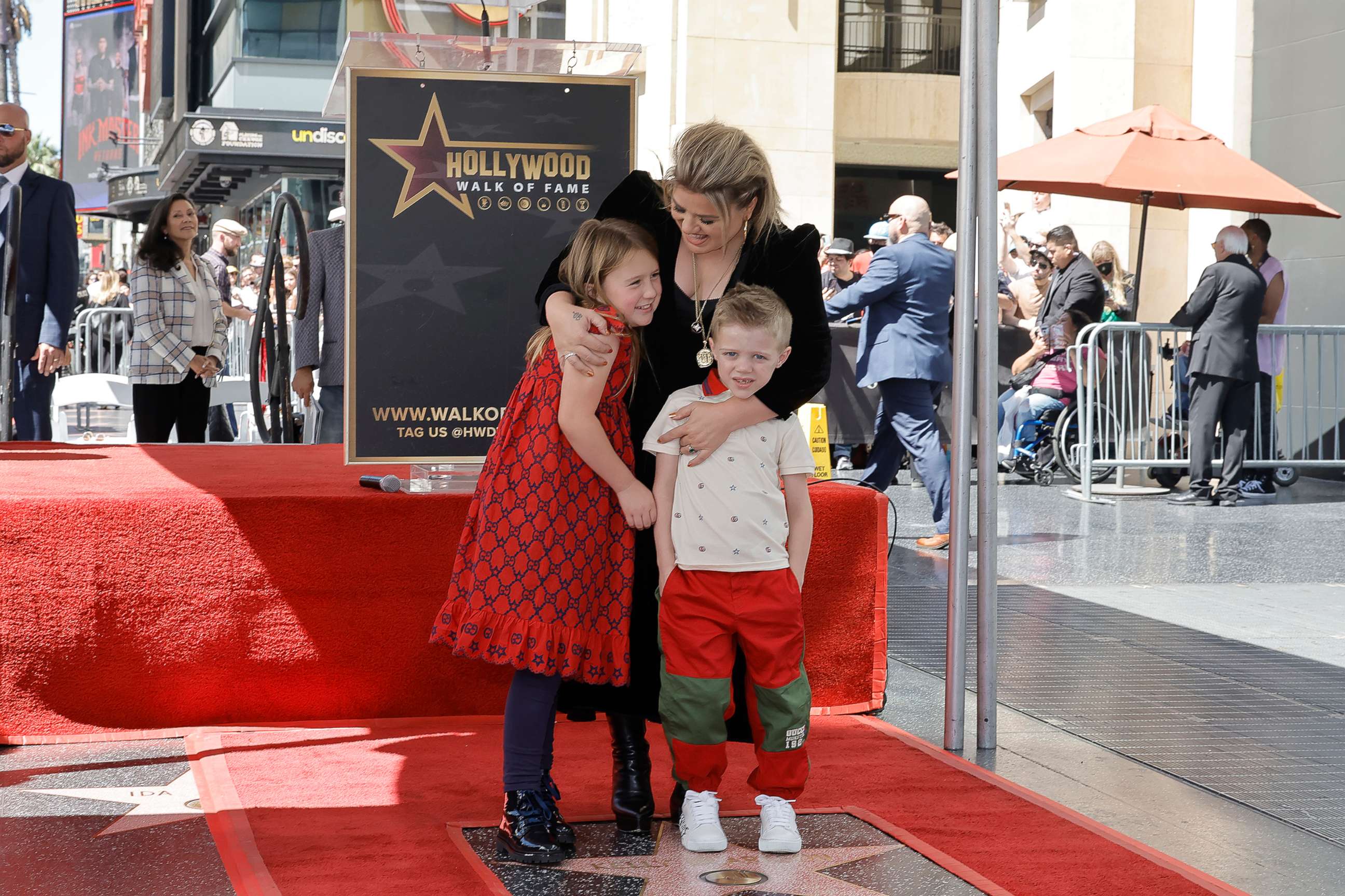 PHOTO: River Rose Blackstock, Kelly Clarkson, and Remington Alexander Blackstock attend The Hollywood Walk Of Fame Star Ceremony for Kelly Clarkson on Sept. 19, 2022 in Los Angeles.