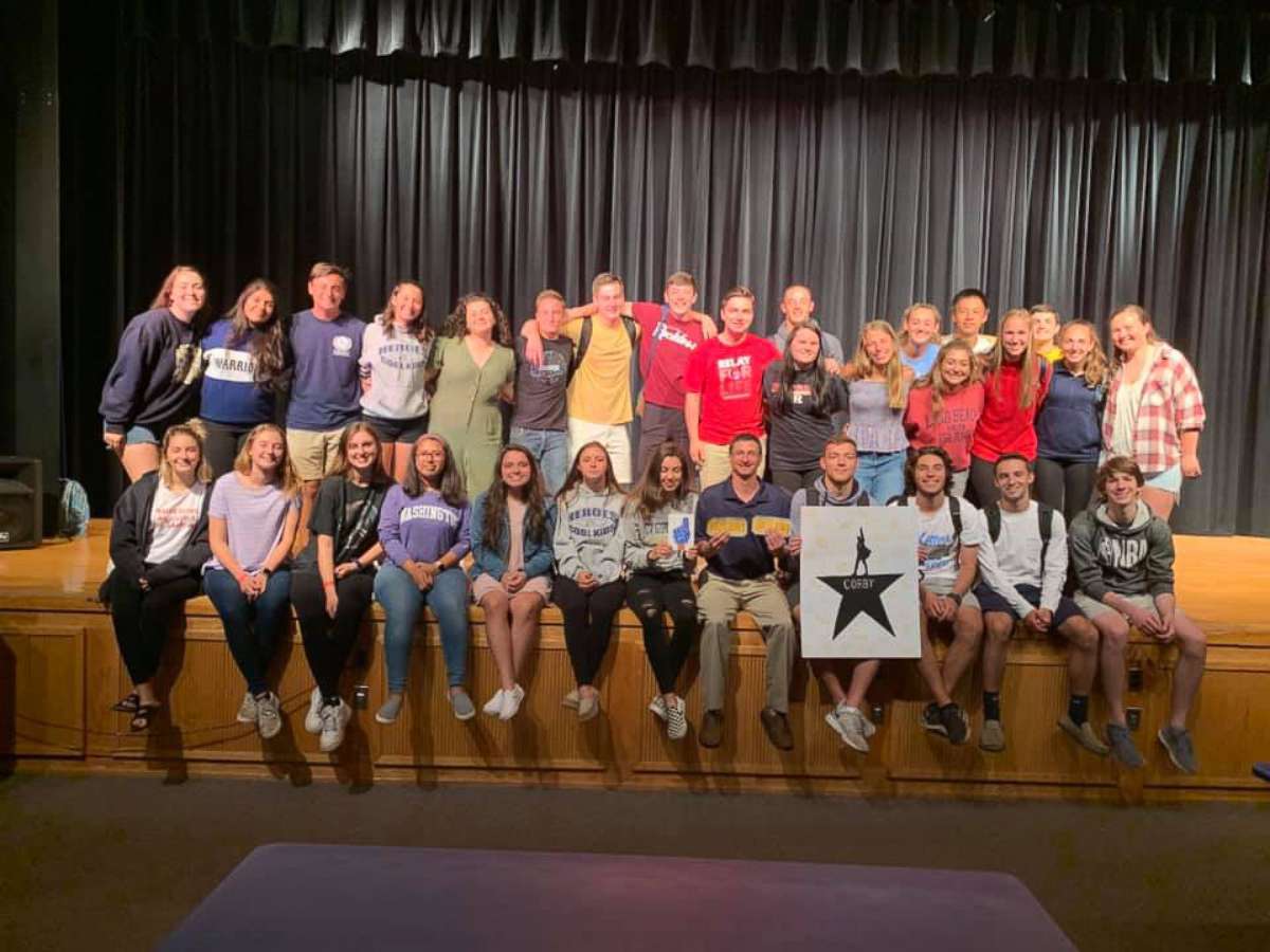 PHOTO: 30 students from Tom Corby's AP Government and AP United States History class posed for a group picture with him after surprising him with tickets to see "Hamilton."