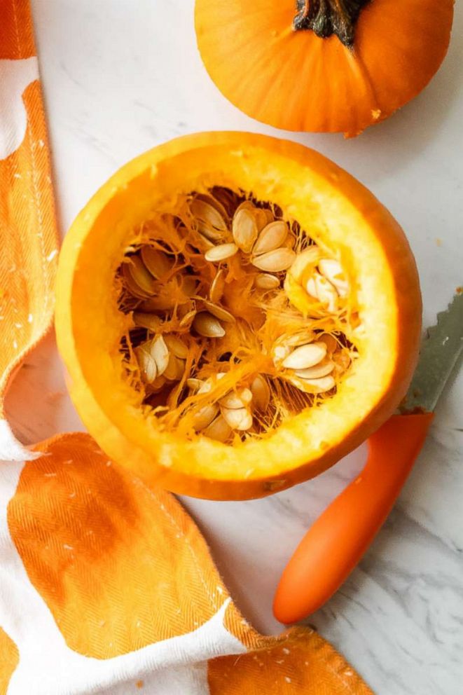 PHOTO: Start by cutting off the top of the pumpkin and scooping out the seeds