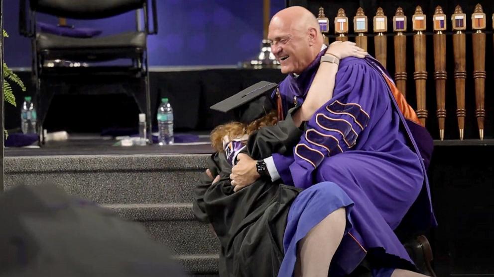 PHOTO: Grace Clements tackled her dad, Clemson University President Jim Clements, with a bear hug at her graduation from the ClemsonLIFE Program.