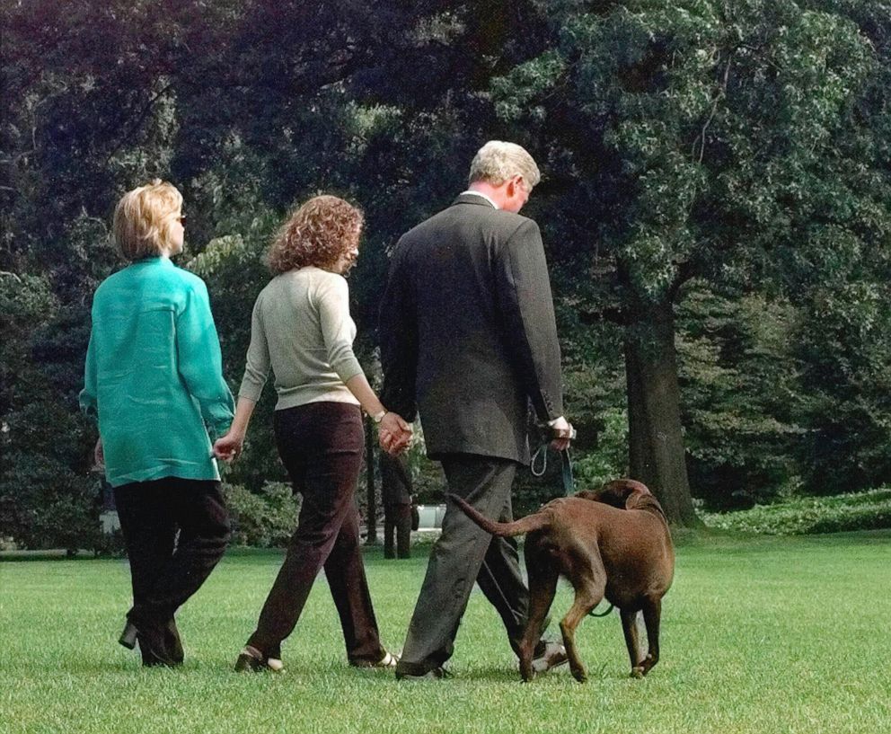 PHOTO: President Clinton, daughter Chelsea and first lady Hillary Rodham Clinton walk with their Labrador "Buddy" to board Marine One on the South Lawn of the White House in Washington, August 18, 1998.
