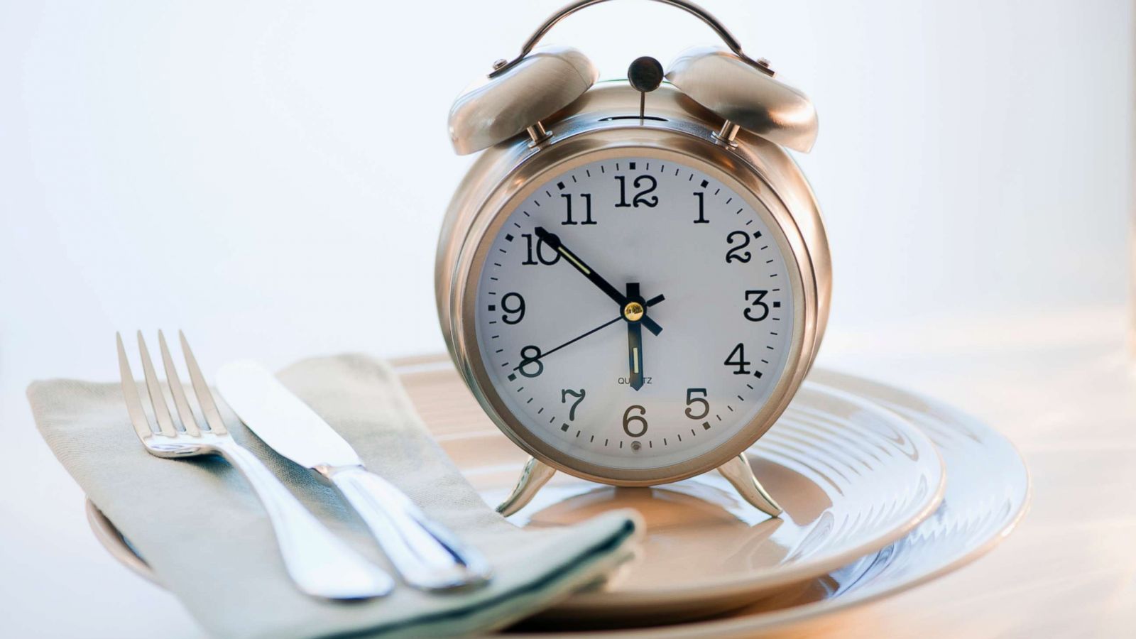 PHOTO: A clock sits on a plate in this stock photo.