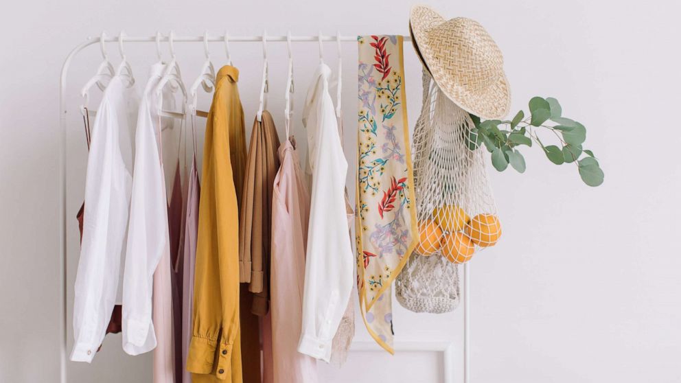 PHOTO: Clothing and accessories hang from a rack in an undated stock photo.