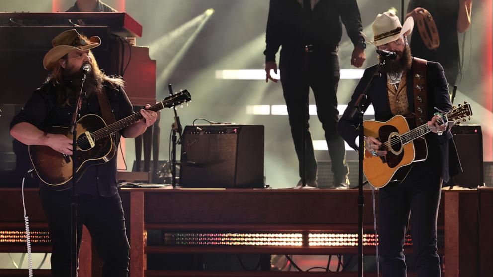 PHOTO: Chris Stapleton and Post Malone perform during the 58th Annual CMA Awards, Nov. 20, 2024, in Nashville.
