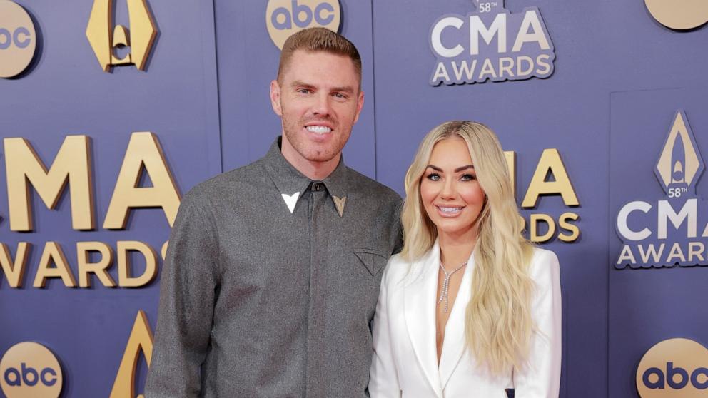 PHOTO: Freddie Freeman and Chelsea Freeman attend the 58th Annual CMA Awards, Nov. 20, 2024, in Nashville.