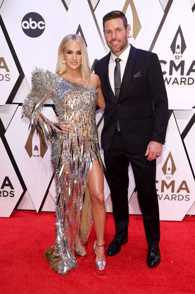 PHOTO: Carrie Underwood and Mike Fisher attend the 55th annual Country Music Association awards in Nashville, Tenn., Nov. 10, 2021.