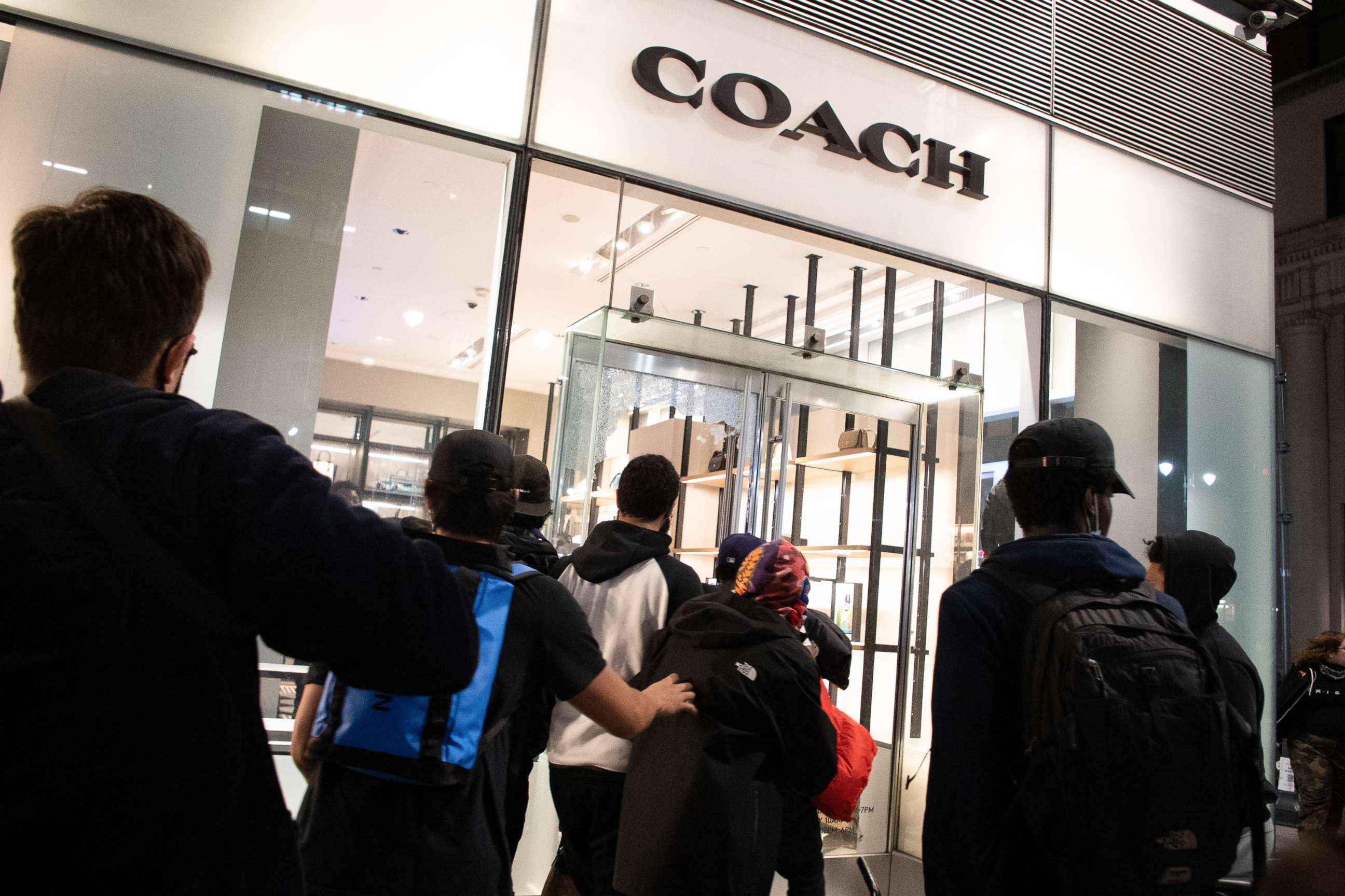 PHOTO: A group of people looting a Coach store in Manhattans 5th avenue after an anti police brutality march, May 31, 2020.