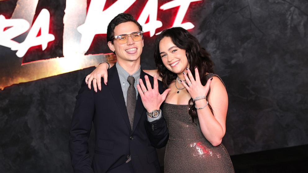 PHOTO: Tanner Buchanan and Mary Mouser arrive at Netflix's "Cobra Kai" Series Finale Premiere Event at The Egyptian Theatre Hollywood, on Feb. 12, 2025, in Los Angeles.