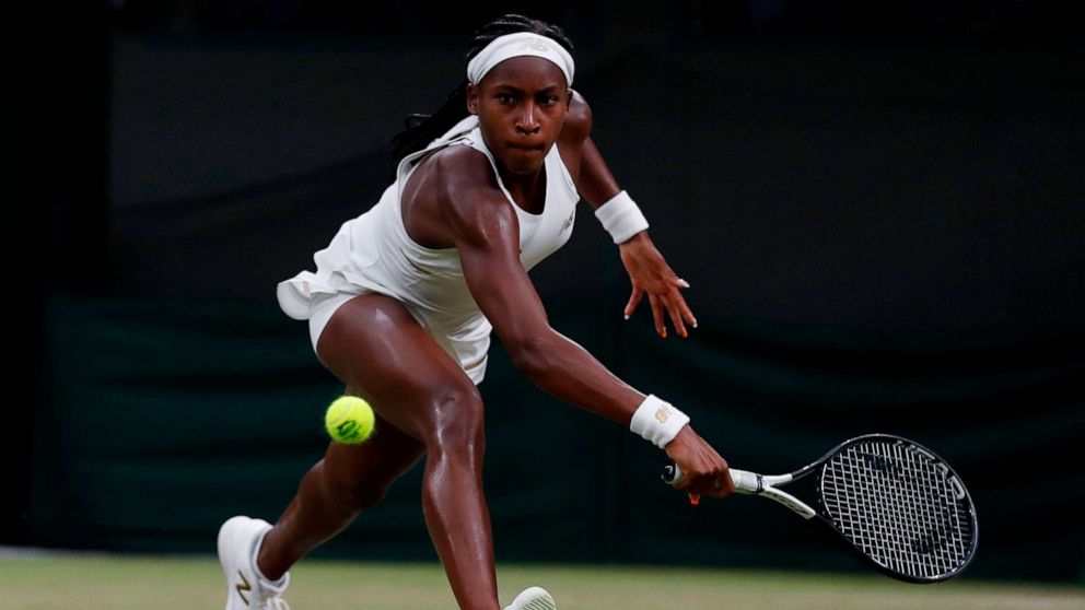 PHOTO: US player Cori Gauff returns against Slovakia's Magdalena Rybarikova during their women's singles second round match on the third day of the 2019 Wimbledon Championships at The All England Lawn Tennis Club in Wimbledon.