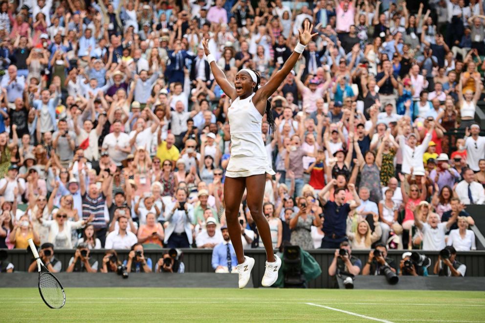PHOTO: US player Cori Gauff celebrates beating Slovenia's Polona Hercog during their women's singles third round match on the fifth day of the 2019 Wimbledon Championships at The All England Lawn Tennis Club in Wimbledon, southwest London, July 5, 2019.