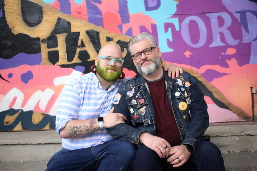 PHOTO: Cody Daigle-Orians poses for a photo with his husband, artist Neil Daigle-Orians, in Hartford, Conn., June 12, 2021.