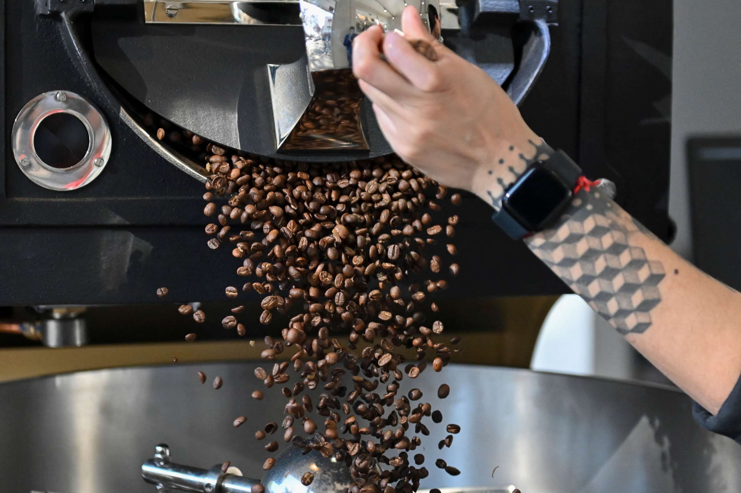 PHOTO: A worker roasts coffee at a coffee shop in Buenos Aires, Argentina, on July 19, 2022.