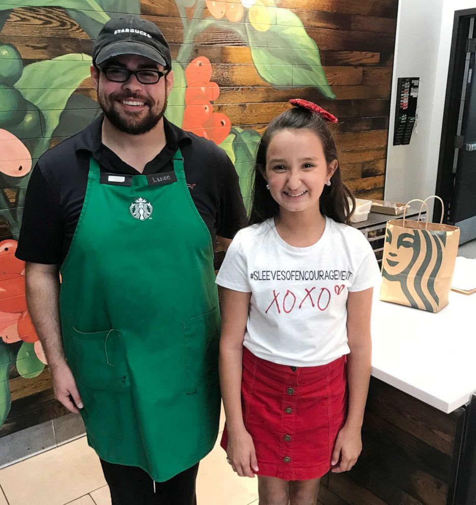 PHOTO: Nine-year-old Ayvah Doyle from Port Neches, Texas, is pictured with a Starbucks employee.