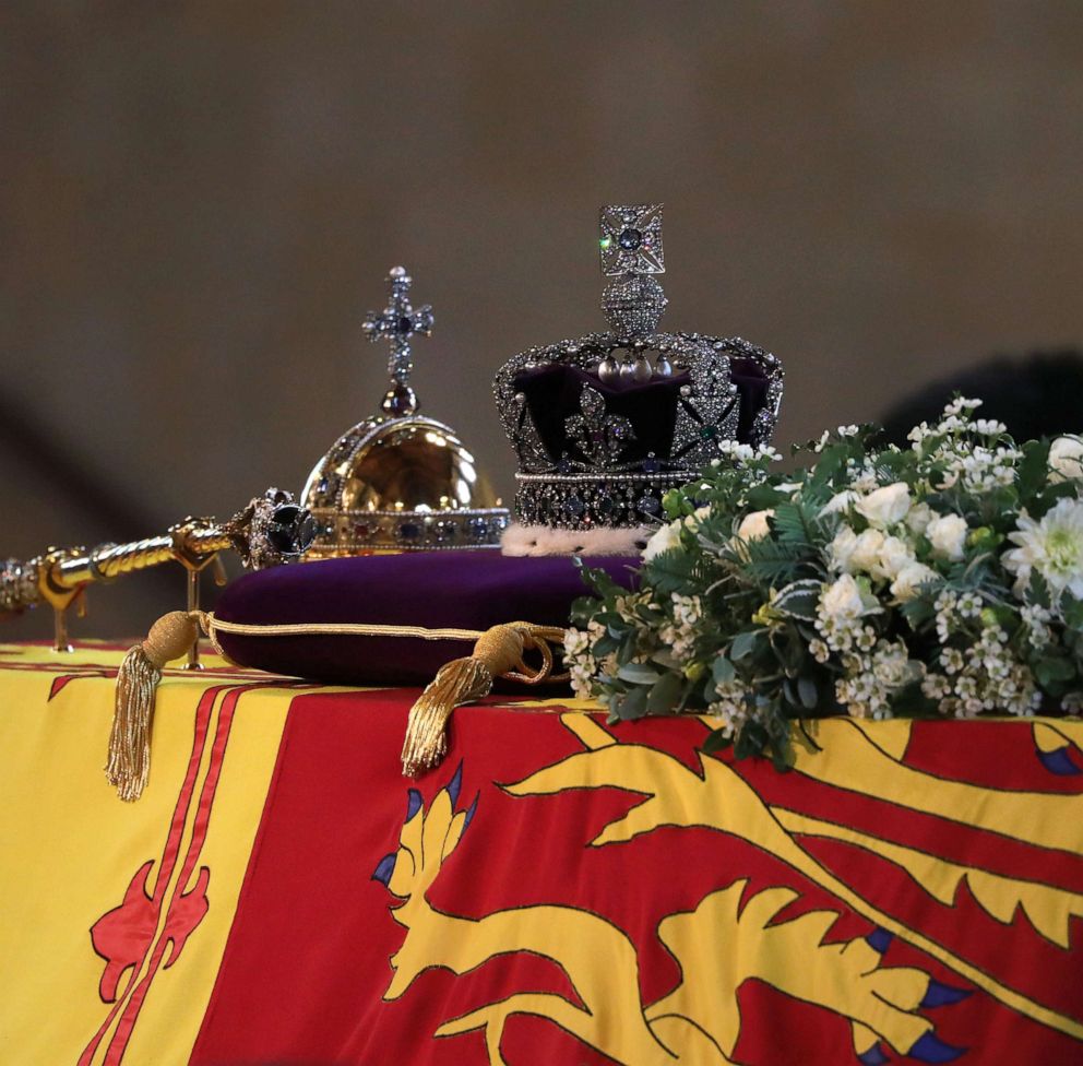 PHOTO: The coffin of Queen Elizabeth II adorned with the Royal Standard and the Instruments of State, the Imperial State Crown, the Orb and the Sceptre, in Westminster Hall, Sept. 15, 2022.