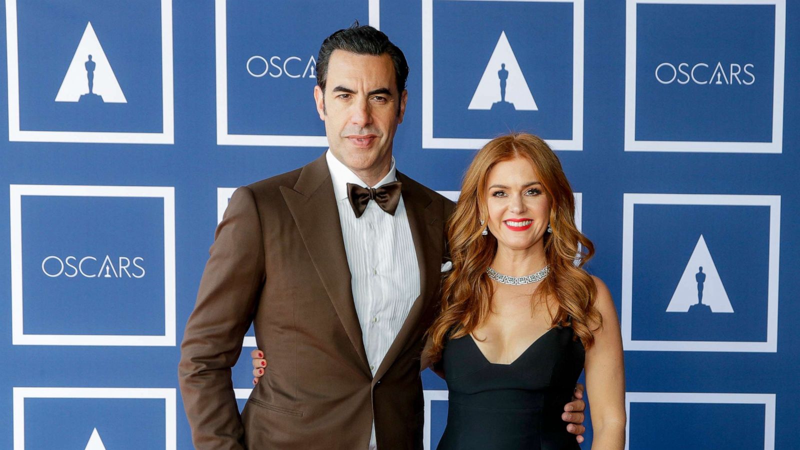 PHOTO: Sacha Baron Cohen, left, and Isla Fisher attend a screening of the Oscars on Monday, April 26, 2021, in Sydney.