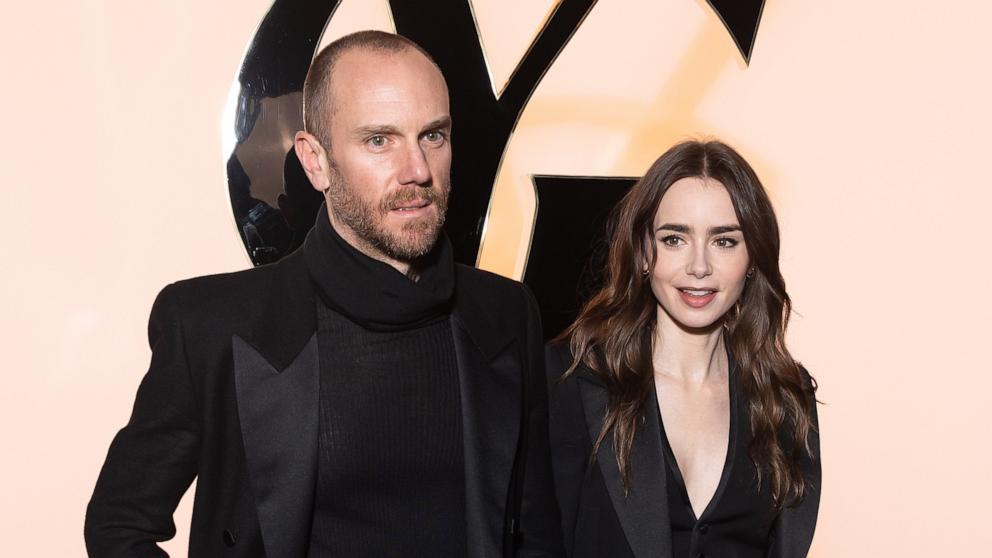 PHOTO: Charlie McDowell and Lily Collins attend the Saint Laurent Womenswear Fall/Winter 2024-2025 show as part of Paris Fashion Week on Feb. 27, 2024 in Paris, France.