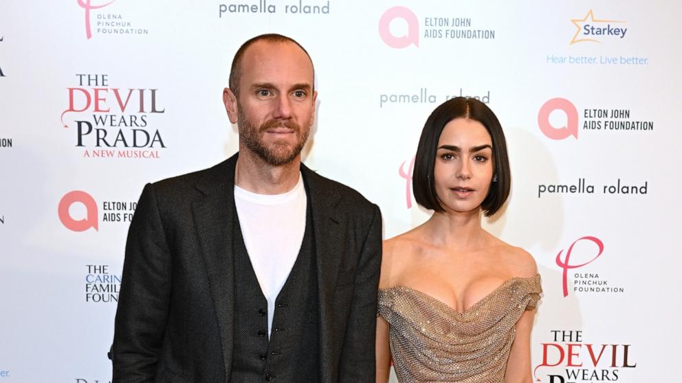 PHOTO: Charlie McDowell and Lily Collins attend "The Devil Wears Prada: The Musical" World Premiere at the Dominion Theatre on Dec. 01, 2024 in London.