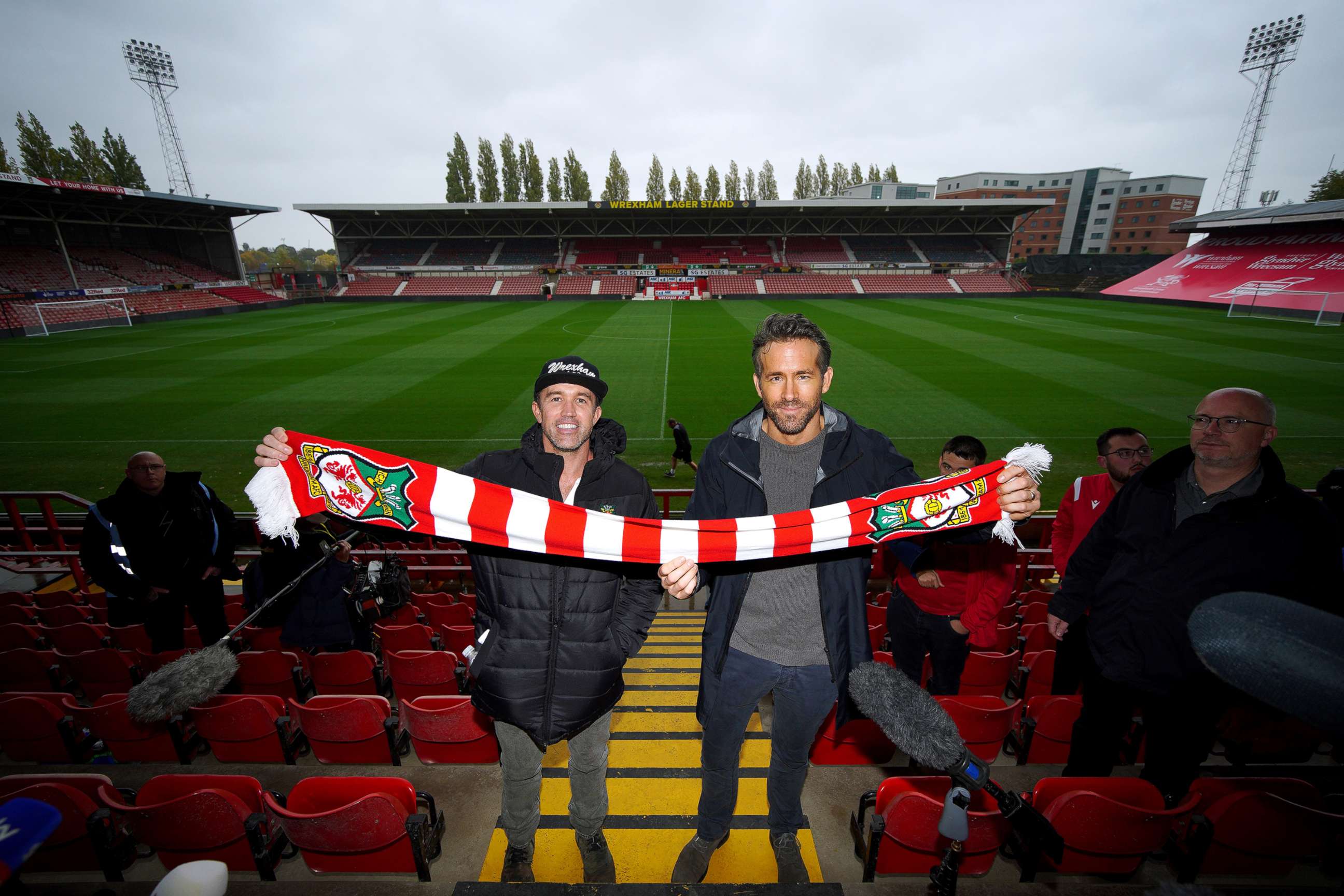 PHOTO: Wrexham co-chairmen Rob McElhenney and Ryan Reynolds attend a press conference at the Racecourse Ground, Wrexham, U.K., Oct. 28, 2021.