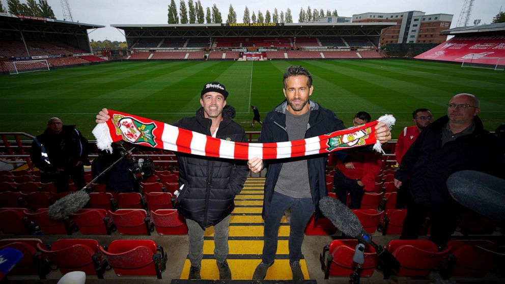 PHOTO: Wrexham co-chairmen Rob McElhenney and Ryan Reynolds attend a press conference at the Racecourse Ground, Wrexham, U.K., Oct. 28, 2021.
