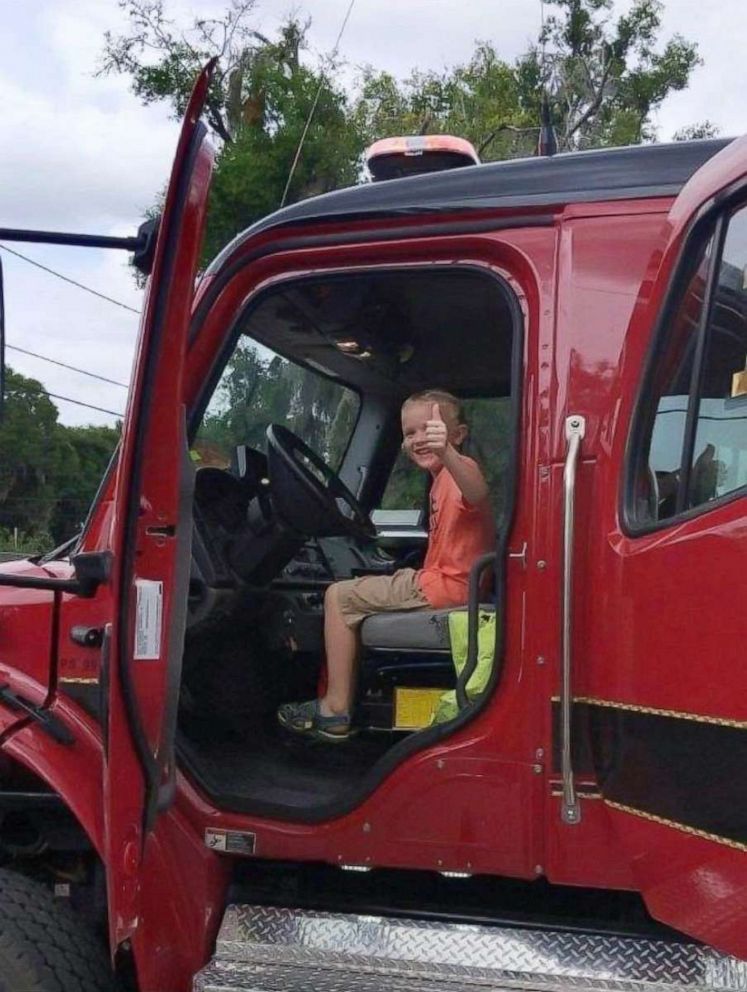 PHOTO: Colten Raymer sits inside of a fire truck after his birthday party at Keystone Beach Park in Keystone Heights, Florida.