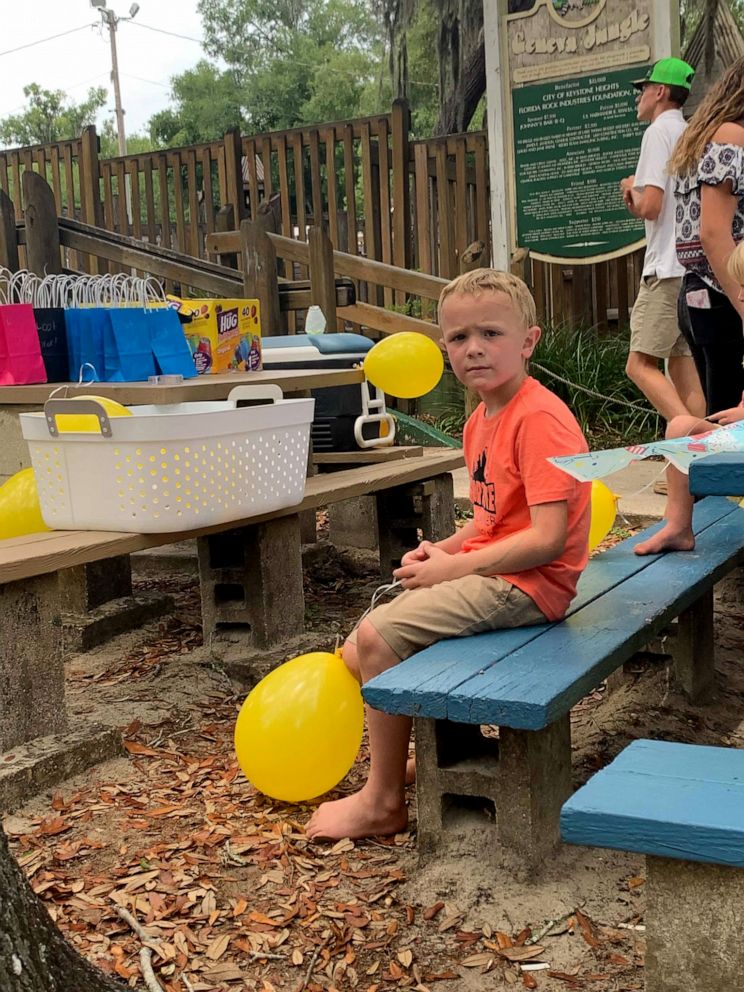 PHOTO: Colten opening his presents duringhis birthday party at Keystone Beach Park in Keystone Heights, Florida.