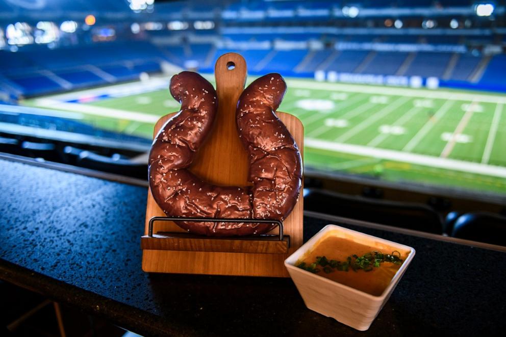 PHOTO: A horseshoe-shaped soft pretzel with cheese dip at Lucas Oil Stadium.