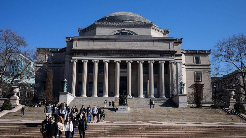 PHOTO: In this file photo, people walk on the Columbia University campus on March 9, 2020 in New York. 