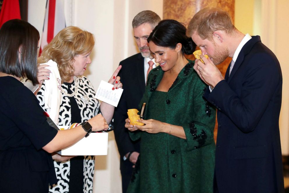 PHOTO: Britain's Prince Harry and Meghan, Duchess of Sussex receive baby gifts from Canadian High Commissioner to the United Kingdom Janice Charette as they attend a Commonwealth Day youth event at Canada House in London, March 11, 2019.