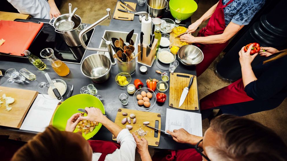 PHOTO: An undated stock image depicts people participating in a cooking class.