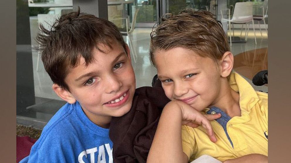PHOTO: Cooper Roberts, 8, who was paralyzed in the July 4, 2022, shooting in Highland Park, Ill., poses with his twin brother Luke.