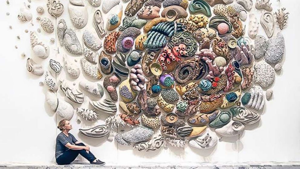 PHOTO: Sculptor Courtney Mattison looks at one of her pieces which is part of the permanent collection at the U.S. Embassy in Jakarta, Indonesia.