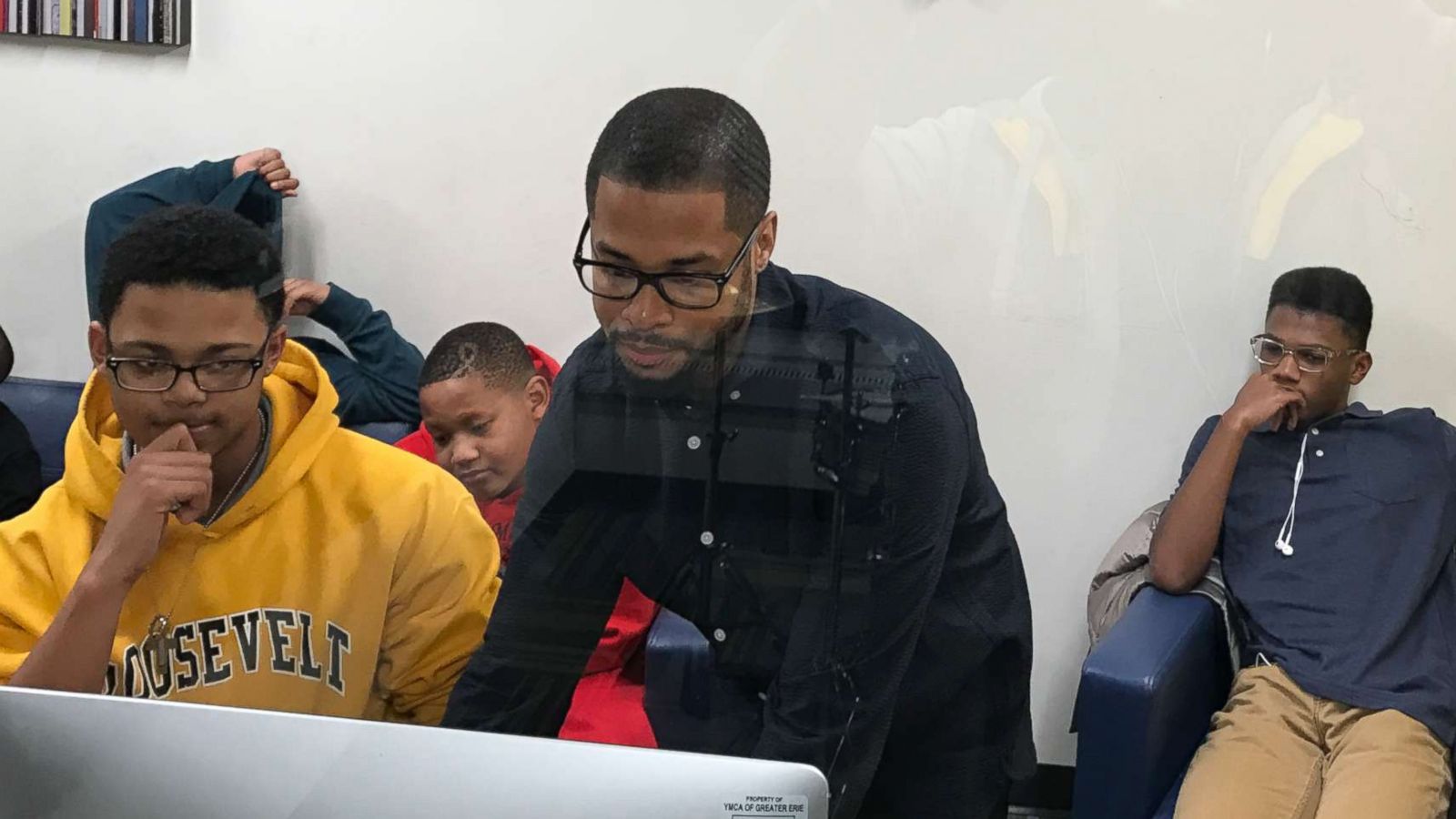 PHOTO: Corey Cook teaches music classes to inner-city teens at the YMCA of Greater Erie.