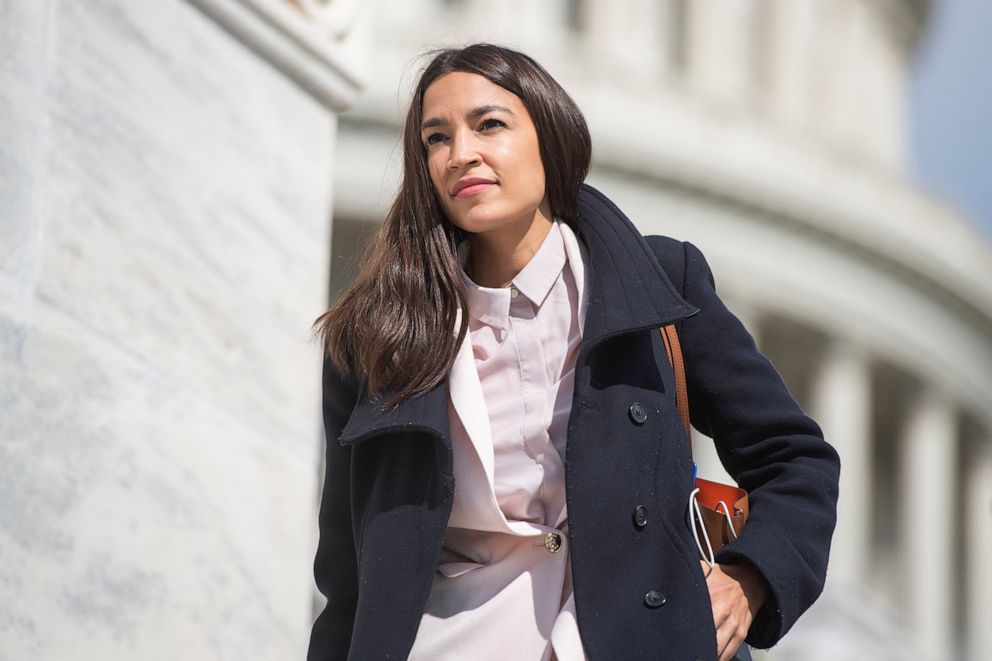 PHOTO: Rep. Alexandria Ocasio-Cortez, D-N.Y., walks on the House steps of the Capitol in Washington, March 27, 2020.