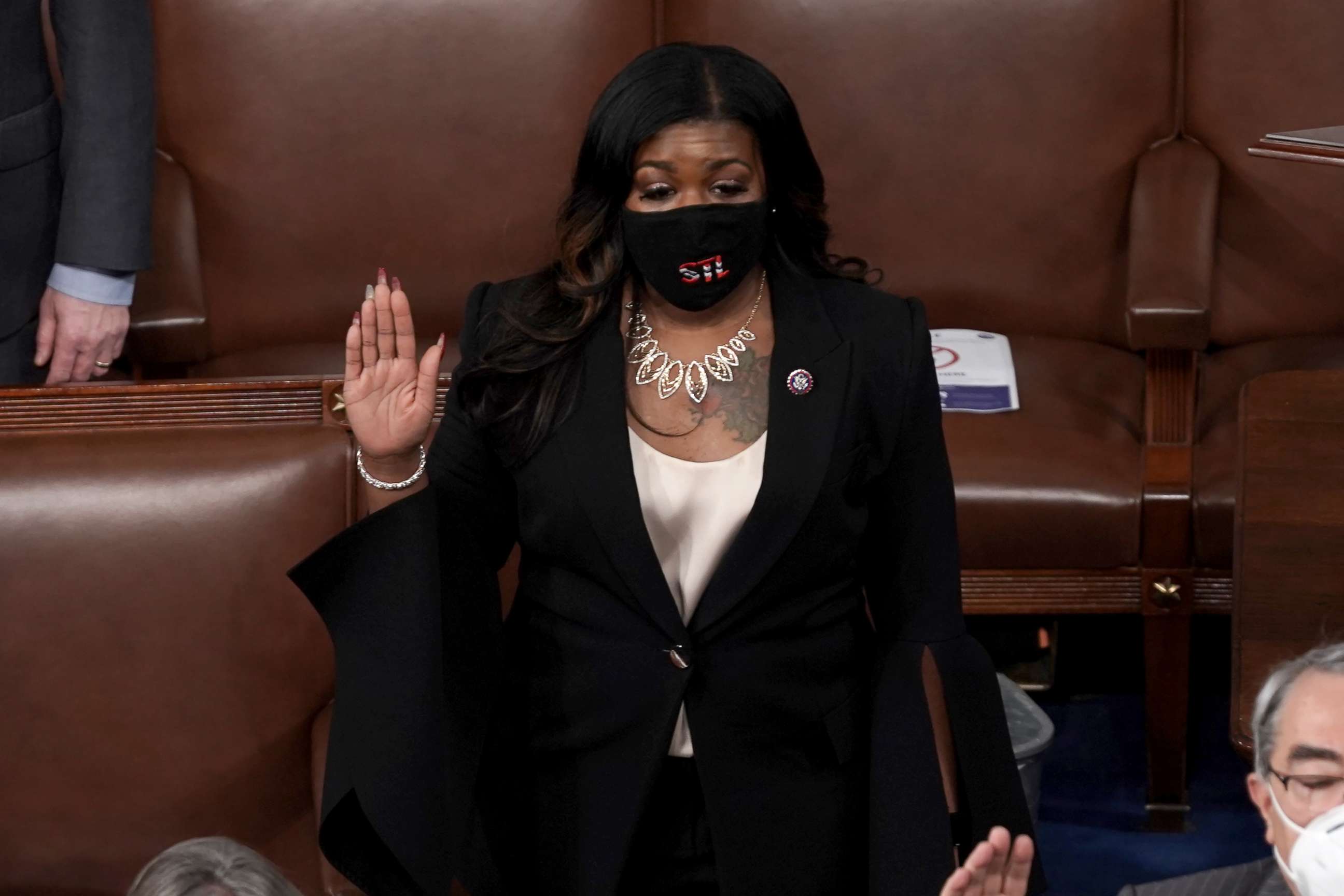 PHOTO: Rep. Cori Bush is sworn in on the House Floor at the U.S. Capitol in Washington, D.C., on Jan. 3, 2021, during the first day of the 117th session of the House of Representatives.