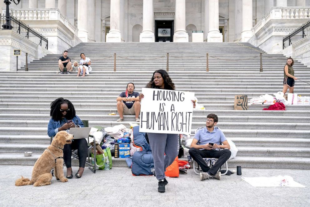 PHOTO: Rep. Cori Bush, joined by Congressional staffers and activists, protests the expiration of the eviction moratorium outside of the U.S. Capitol in Washington, D.C. on July 31, 2021.
