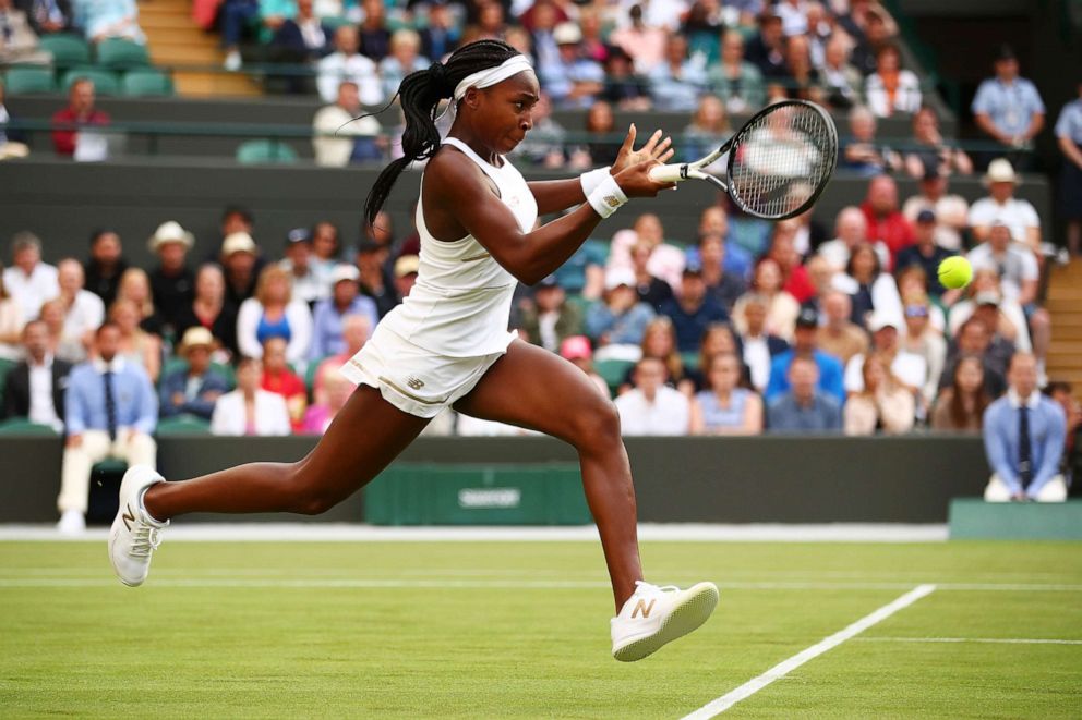 PHOTO: Cori Gauff of the United States plays a backhand in her Ladies' Singles first round match against Venus Williams of the United States during day one of The Championships - Wimbledon 2019 on July 01, 2019, in London.