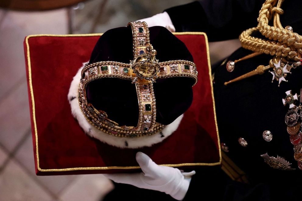 PHOTO: 17th Century St Edward's Crown is carried on the day of Britain's King Charles and Queen Camilla coronation ceremony at Westminster Abbey, in London, May 6, 2023.