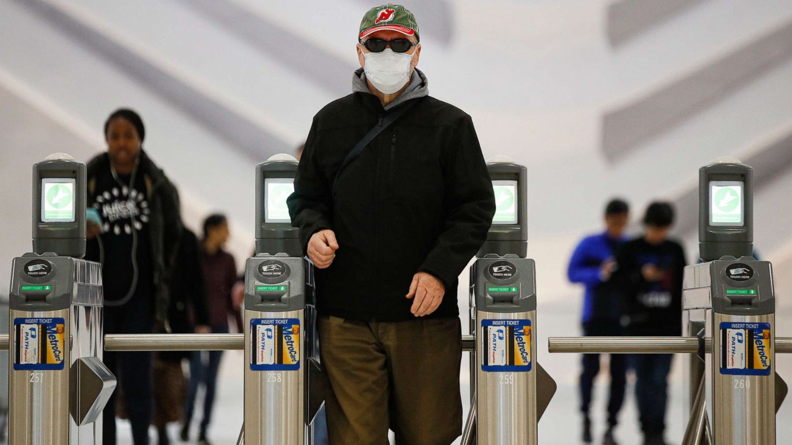 PHOTO: A commuter wears a face mask in the New York City transit system, March 9, 2020, in New York.