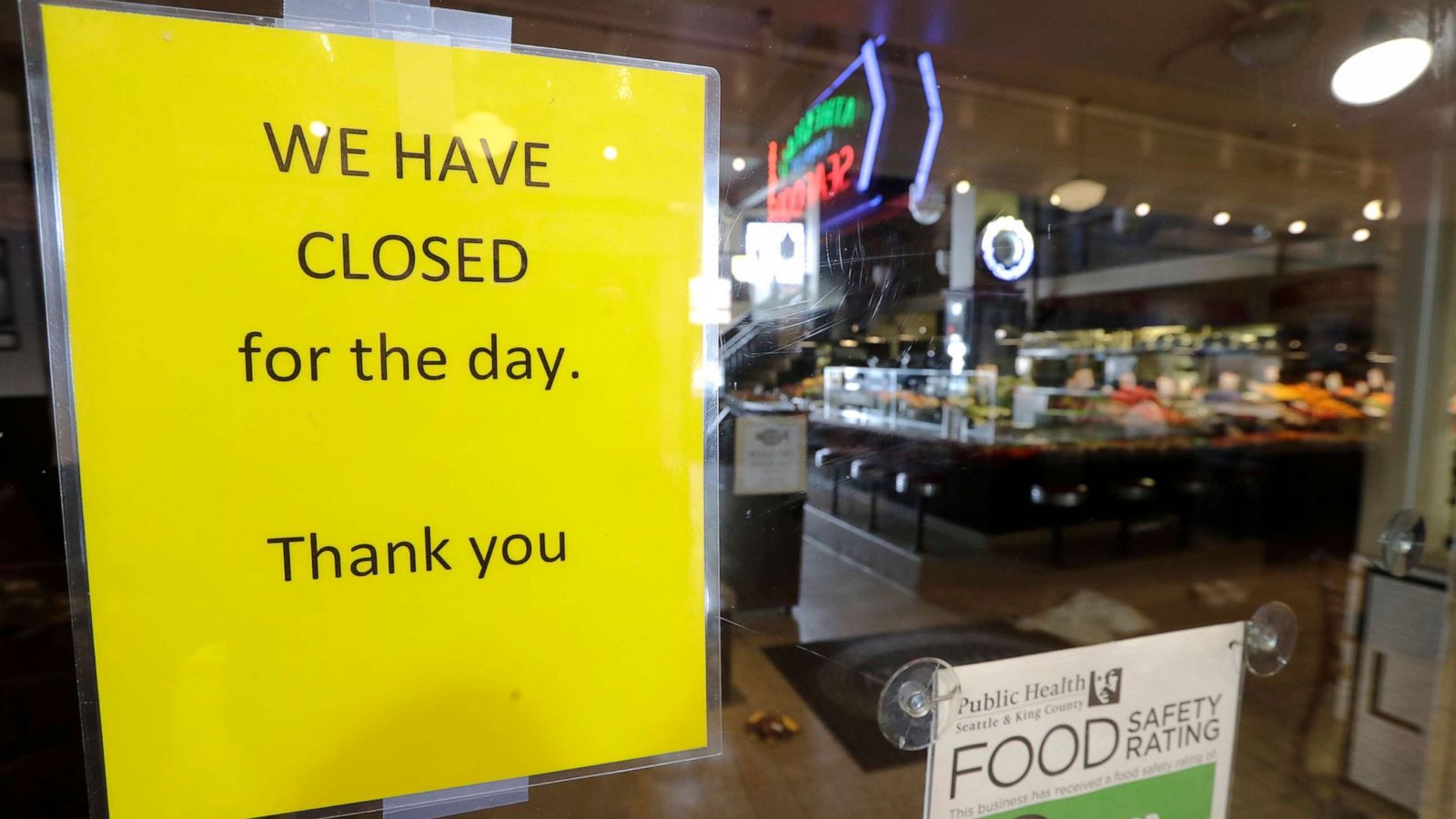 PHOTO: A sign advises of the closure of a restaurant at Pike Place Market, March 17, 2020, in Seattle.