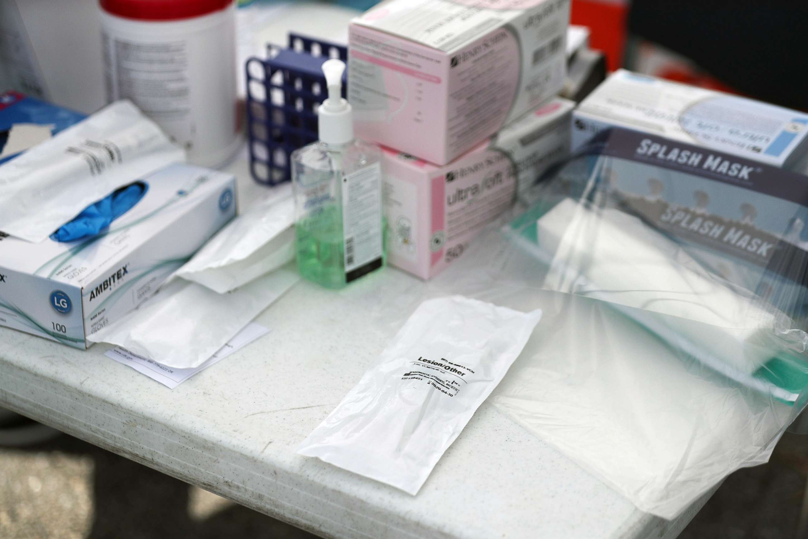 PHOTO: A coronavirus test kit is seen in its protective pouch on a table as health care staff members from the FoundCare center on March 16, 2020 in West Palm Beach, Fla.